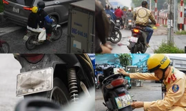 Muôn kiểu chiêu trò che biển né ‘mắt thần’ AI trên đường phố Hà Nội