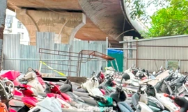 Di dời bãi xe, công trình lấn chiếm ra khỏi gầm cầu Vĩnh Tuy vẫn dang dở