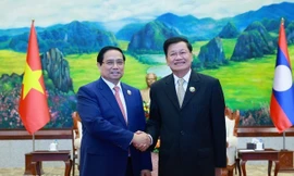Quan hệ vĩ đại Việt Nam - Lào ngày càng phát triển lên tầm cao mới