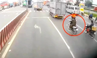 Người phụ nữ thoát chết thần kỳ dưới gầm container