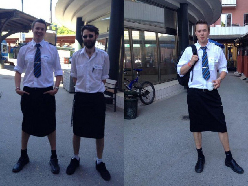 Nam lái tàu mặc váy đi làm