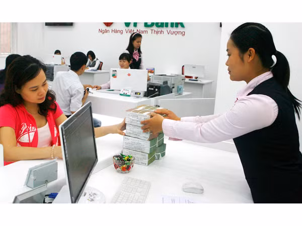 Dù lãi suất ưu đãi nhưng nhiều DN (trong diện ưu đãi) vẫn không thể tiếp cận được vốn với lãi suất 15% (Ảnh minh họa của Hồng Vĩnh)