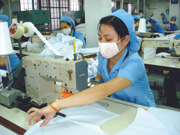 Dệt may là ngành có mức thưởng bình quân khá cao so với năm ngoái. Ảnh: Đại Dương