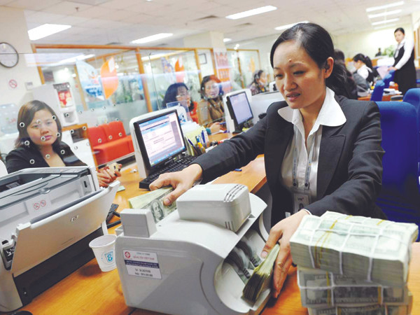 Cơ hội nào cho doanh nghiệp tiếp cận vốn vay với lãi suất 14%/năm? Ảnh: Hồng Vĩnh