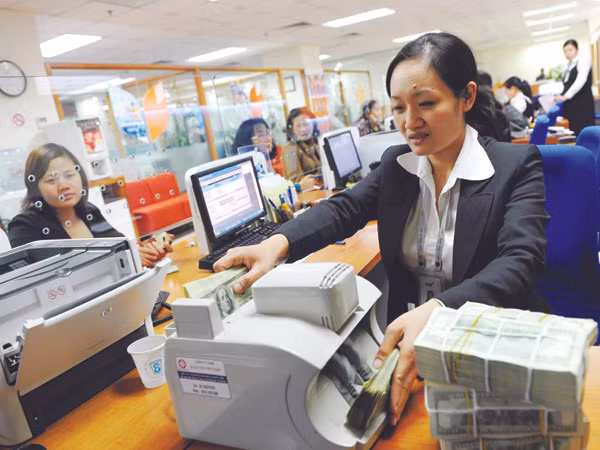 Cơ hội nào cho doanh nghiệp tiếp cận vốn vay với lãi suất 14%/năm? Ảnh: Hồng Vĩnh