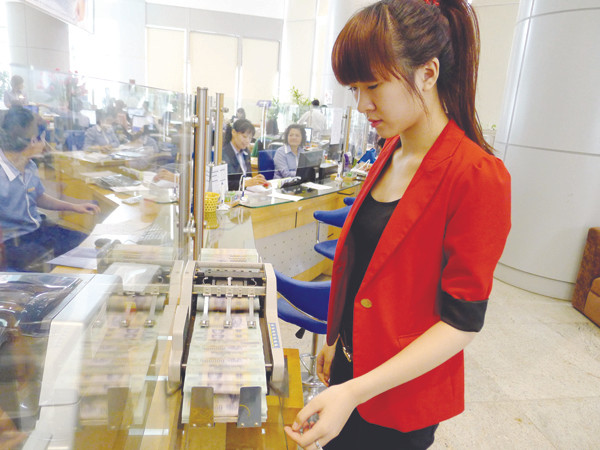 Ngân hàng là một trong những ngành dự báo có mức thưởng cao nhất. Ảnh: Xuân Phú