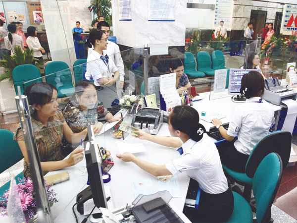 Nhiều ngân hàng vẫn lãi lớn giữa lúc các doanh nghiệp lao đao Ảnh minh họa: Hồng Vĩnh