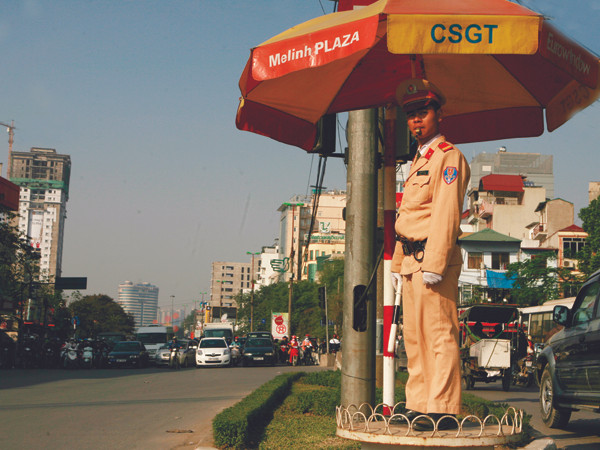 Cảnh sát giao thông sẽ ra đường từ 6 giờ sáng để duy trì trật tự. Ảnh: Hồng Vĩnh