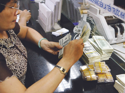 Ngân hàng Nhà nước: Ưu tiên xử lý nợ xấu, tái cơ cấu