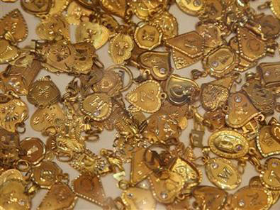 Vàng thế giới lại tăng lên mức cao nhất trong ba tuần