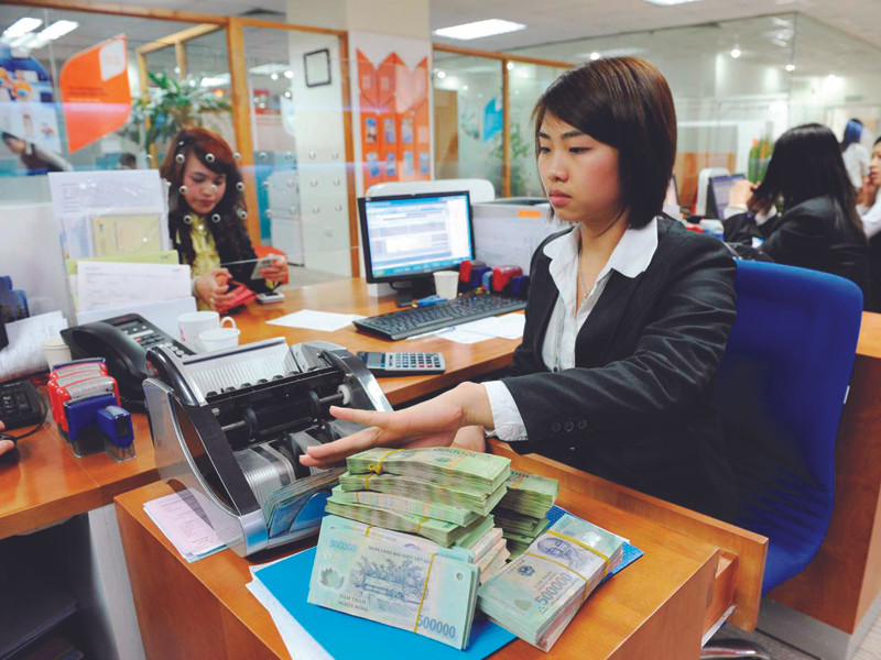 Sau Tết, các ngân hàng vẫn chưa hết căng thanh khoản. Ảnh: Hồng Vĩnh
