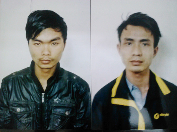 Hai đối tượng Phạm Ngọc Quang (phải) và Nguyễn Bá Sản