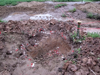 Di dời mộ bị san lấp sang nghĩa trang mới