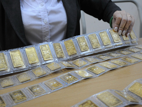 Khai Xuân, giá vàng nội - ngoại cùng giảm