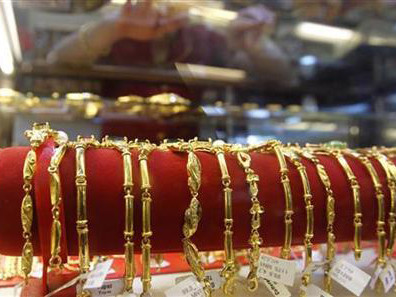 Vàng giảm mạnh xuống dưới 38 triệu