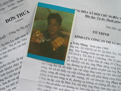 Ông Ly bị còng và đơn tố cáo vụ việc