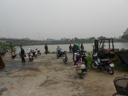 Phát hiện xác cô gái trôi sông đang phân hủy nặng