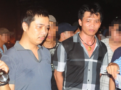 Hai đối tượng Nguyễn Văn Nhật (trái) và Đỗ Đình Xuân (phải)