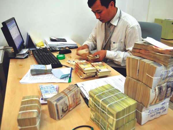 Bao nhiêu tiền để có thể mua hết nợ xấu? Ảnh: Hồng Vĩnh