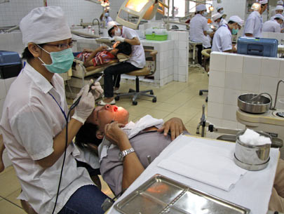 Nhổ 4 chiếc răng khôn có sao không?