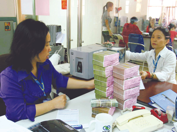 Tỷ lệ nợ xấu của các ngân hàng hiện lên tới 8,6%, tương đương khoảng 202.000 tỷ đồng Ảnh: Hồng Vĩnh