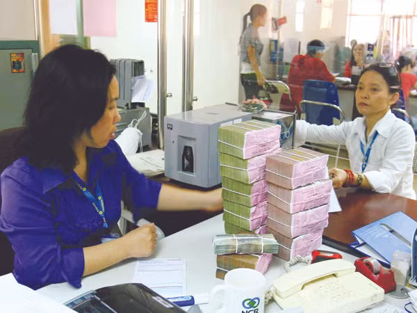 Tỷ lệ nợ xấu của các ngân hàng hiện lên tới 8,6%, tương đương khoảng 202.000 tỷ đồng Ảnh: Hồng Vĩnh