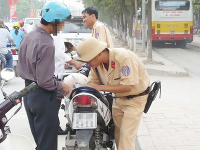Theo dự thảo, nếu đến hẹn người vi phạm không nộp phạt sẽ bị tính tăng mức phạt. Ảnh: T.Đảng.
