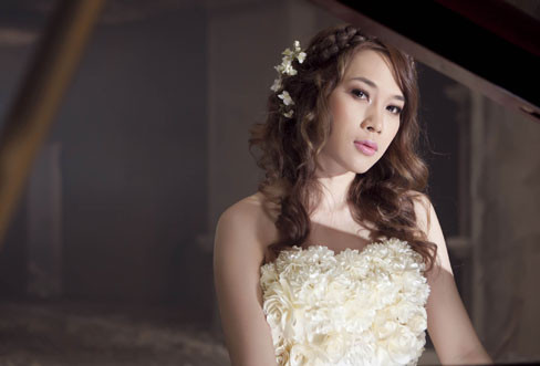 Mỹ Tâm cắt phăng tóc vì thất tình