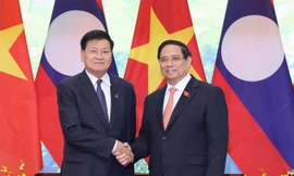 Tổng Bí thư, Chủ tịch nước Lào đặc biệt chúc mừng Việt Nam đăng cai sự kiện có ý nghĩa lịch sử