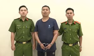 Ma Cai tại cơ quan điều tra.