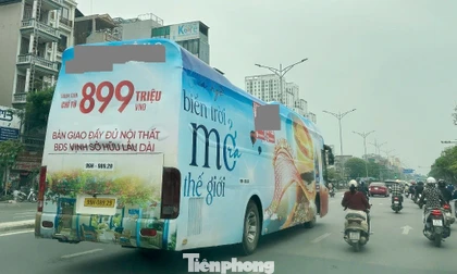 Xe khách biển số Bắc Ninh trùm kín biển quảng cáo 'diễu phố' ở Hà Nội