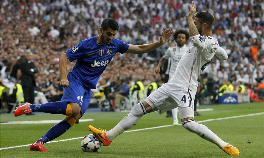 Cố nhân Morata (trái) gieo sầu cho Real.