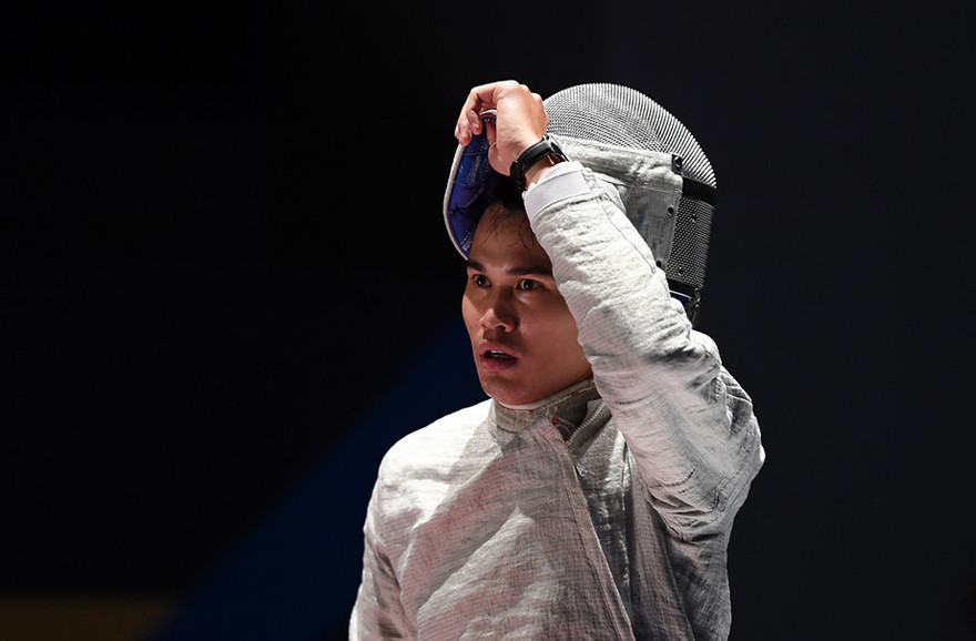 VĐV Nguyễn Xuân Lợi đã để thua đáng tiếc 14-15 trước VĐV của Thái Lan. Ảnh: Zing