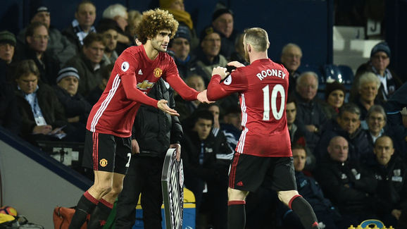 Wayne Rooney và Marouane Fellaini