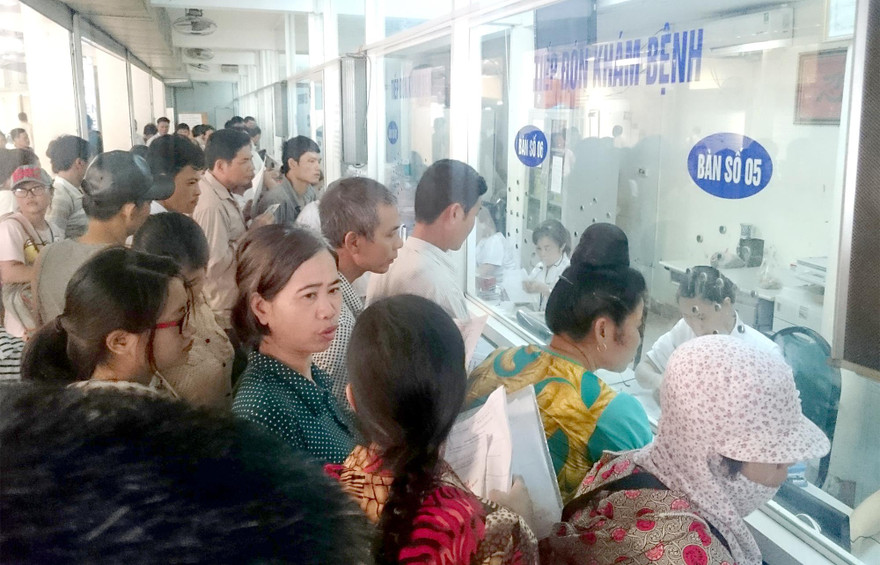 Trong tương lai, với thẻ BHYT điện tử, thời gian và chi phí cho giải quyết thủ tục khám chữa bệnh sẽ được rút ngắng. Ảnh: Như Ý.