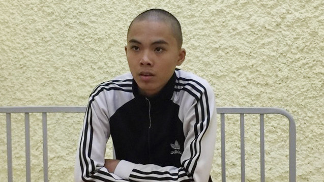 Đối tượng Long tại cơ quan điều tra .Ảnh: H. Thơ