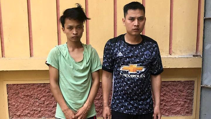 Hai đối tượng Báo và Thân tại cơ quan công an *ảnh: Duy Chiến