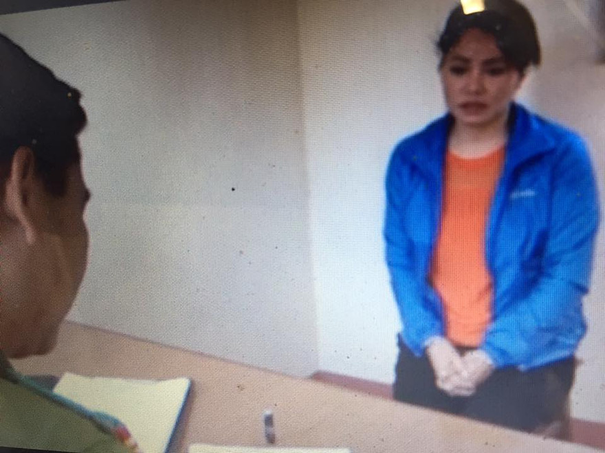 Bà Thu khai nhận hành vi lừa đảo với cơ quan điều tra công an tỉnh Lạng Sơn. Ảnh: TL