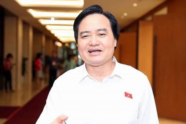 Bộ trưởng Phùng Xuân Nhạ trao đổi với báo chí ngày 22/5. Ảnh Như Ý