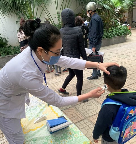 Học sinh sẽ được đo nhiệt độ trước khi quay lại lớp.