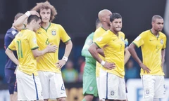 Brasil kết thúc trong thất vọng, Scolari vẫn chưa từ chức. Ảnh: AP/Getty Images