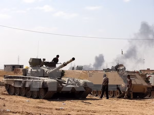 Binh sỹ Iraq trong chiến dịch giành lại quyền kiểm soát nhà máy lọc dầu Baiji. (Nguồn: AFP/TTXVN)