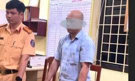 Tài xế L. V. M làm việc tại trụ sở công an.