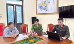 Cơ quan Công an làm việc với người vi phạm.