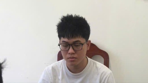 Đối tượng Lê Minh Nghĩa tại cơ quan công an. 797673377072987884-6538.jpg