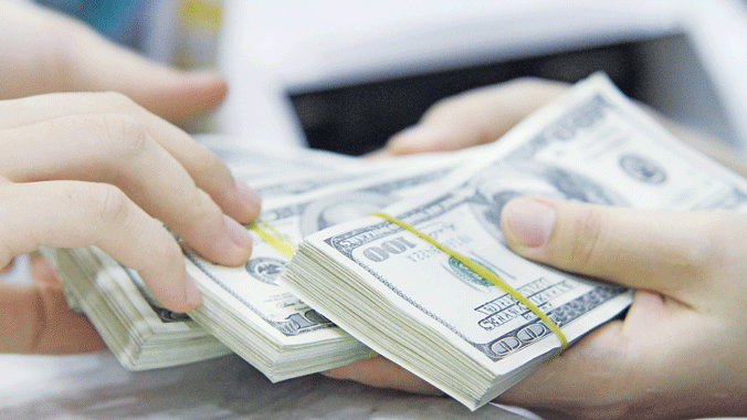 Điều chỉnh tỷ giá, nhiều DN nhập khẩu lo tăng chi phí. Ảnh: Như Ý.