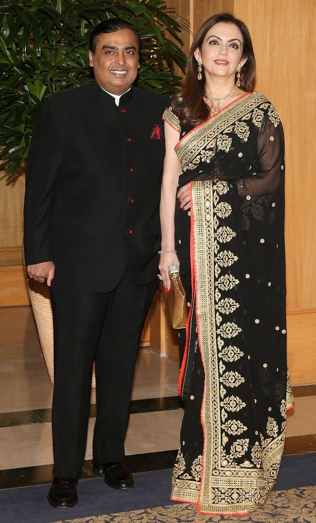 Tỷ phú Mukesh Ambani cùng vợ Nita. (Nguồn: Getty Images Europe) Tỷ phú Mukesh Ambani cùng vợ Nita. (Nguồn: Getty Images Europe)