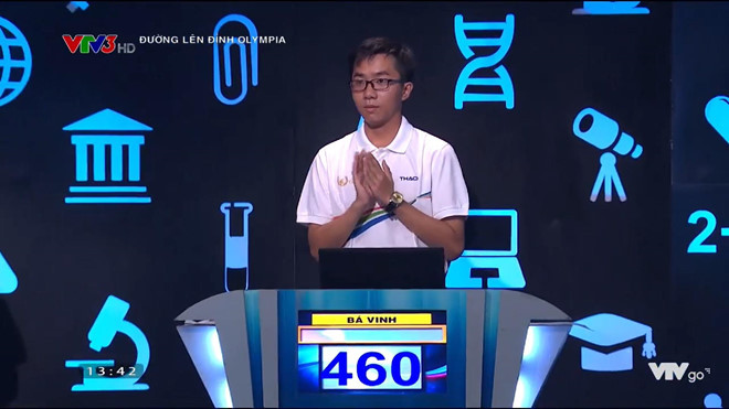 Nguyễn Bá Vinh ghi tên mình vào bảng thành tích kỷ lục của "Đường lên đỉnh Olympia" với điểm số 460. Ảnh cắt từ clip. Nguyễn Bá Vinh ghi tên mình vào bảng thành tích kỷ lục của "Đường lên đỉnh Olympia" với điểm số 460. Ảnh cắt từ clip.
