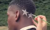 Pogba khoe cảnh cắt tóc mới lên trang Instagram.