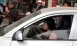 Nữ tài xế điều khiển ôtô vi phạm. Ảnh: Cắt từ clip